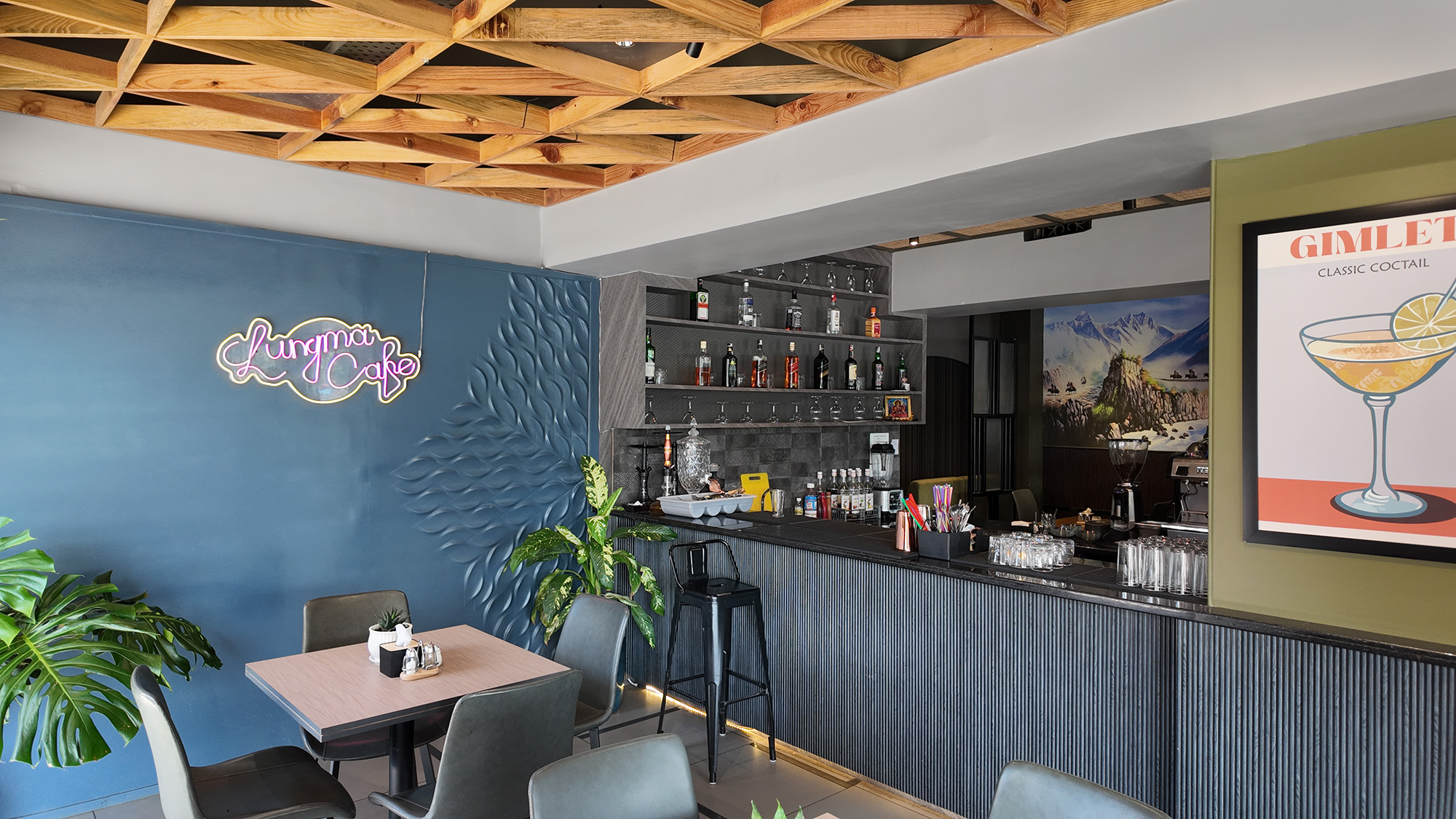 Interior design in Jhapa with a cozy bar area and stylish furnishings of cafe named Lungma Cafe
