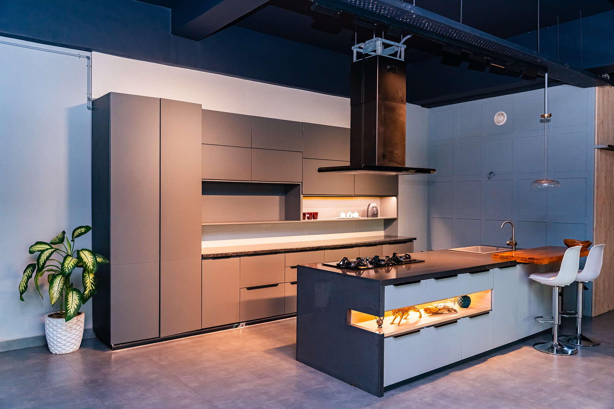 Elegant Modular Kitchen In Jhapa featuring a harmonious blend of color and texture.